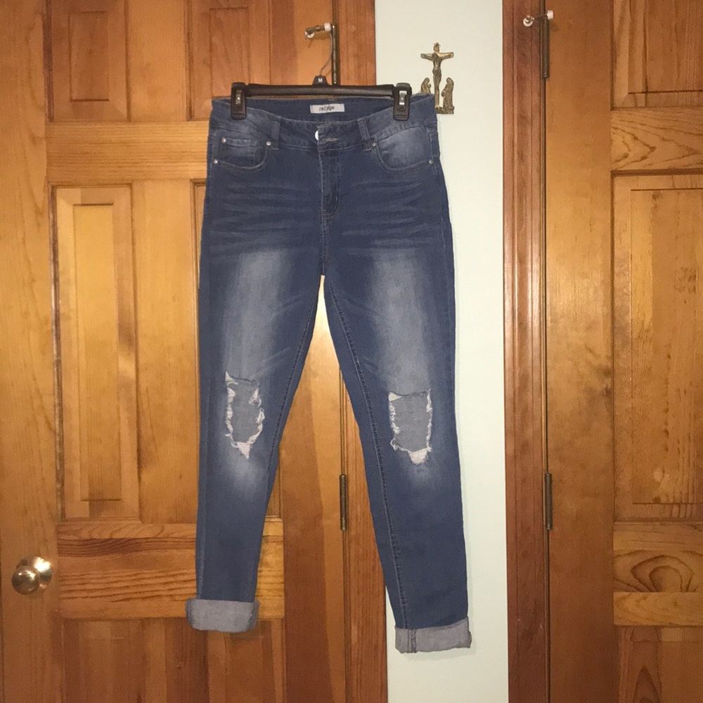 Ripped blue jeans.